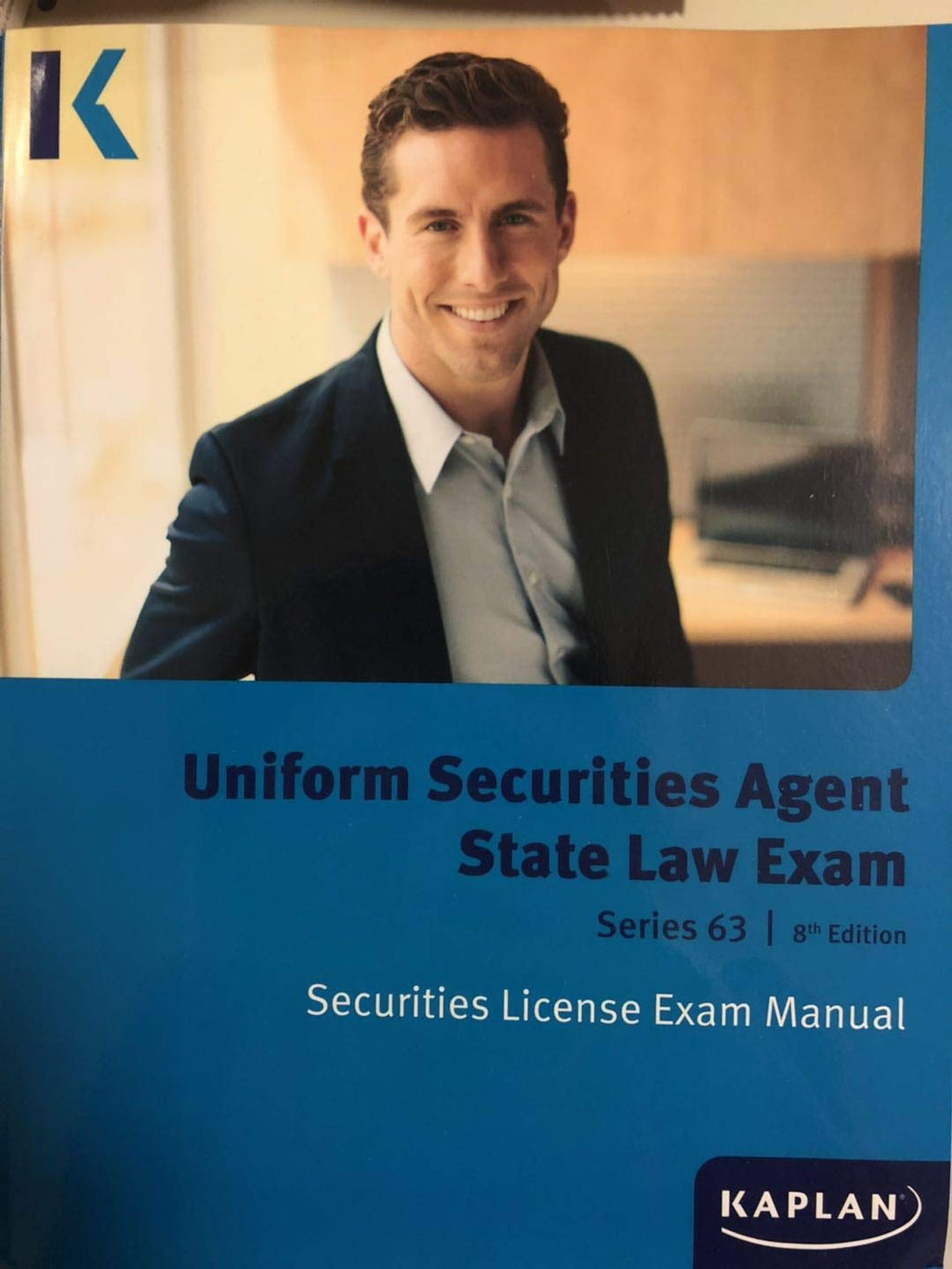 Kaplan Series 63 License Exam Manual, 8th Edition (Paperback): Comprehensive Securities Licensing Exam Manual