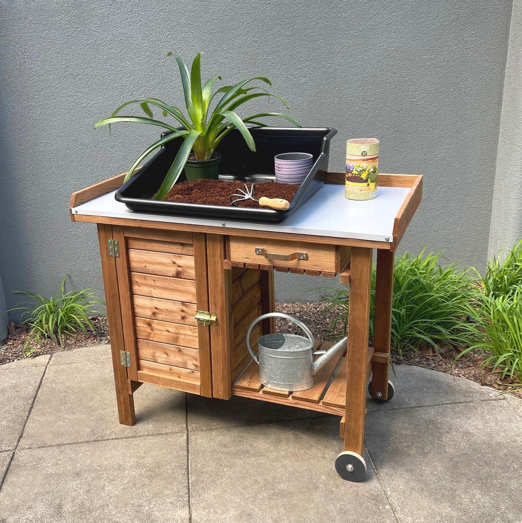 Gardener's Table with Tin Work Surface, Wheels, Cabinet, and Drawer, 42.5' L x 20.5' W x 35.5' H; 73 lbs