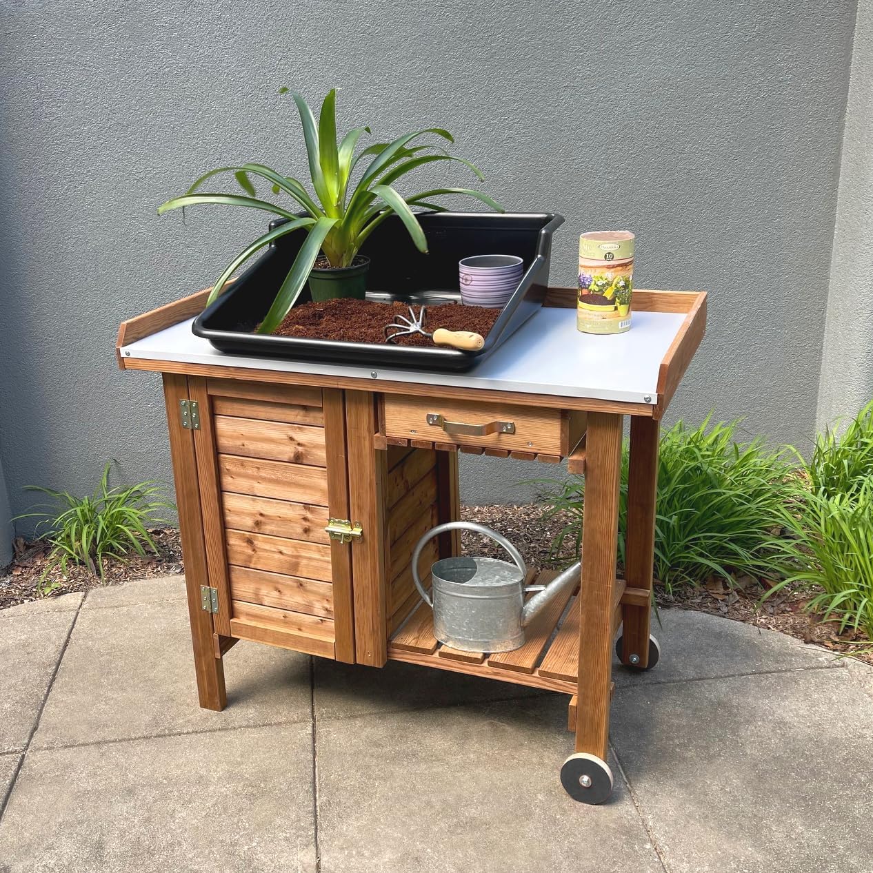 Gardener's Table with Tin Work Surface, Wheels, Cabinet, and Drawer, 42.5' L x 20.5' W x 35.5' H; 73 lbs
