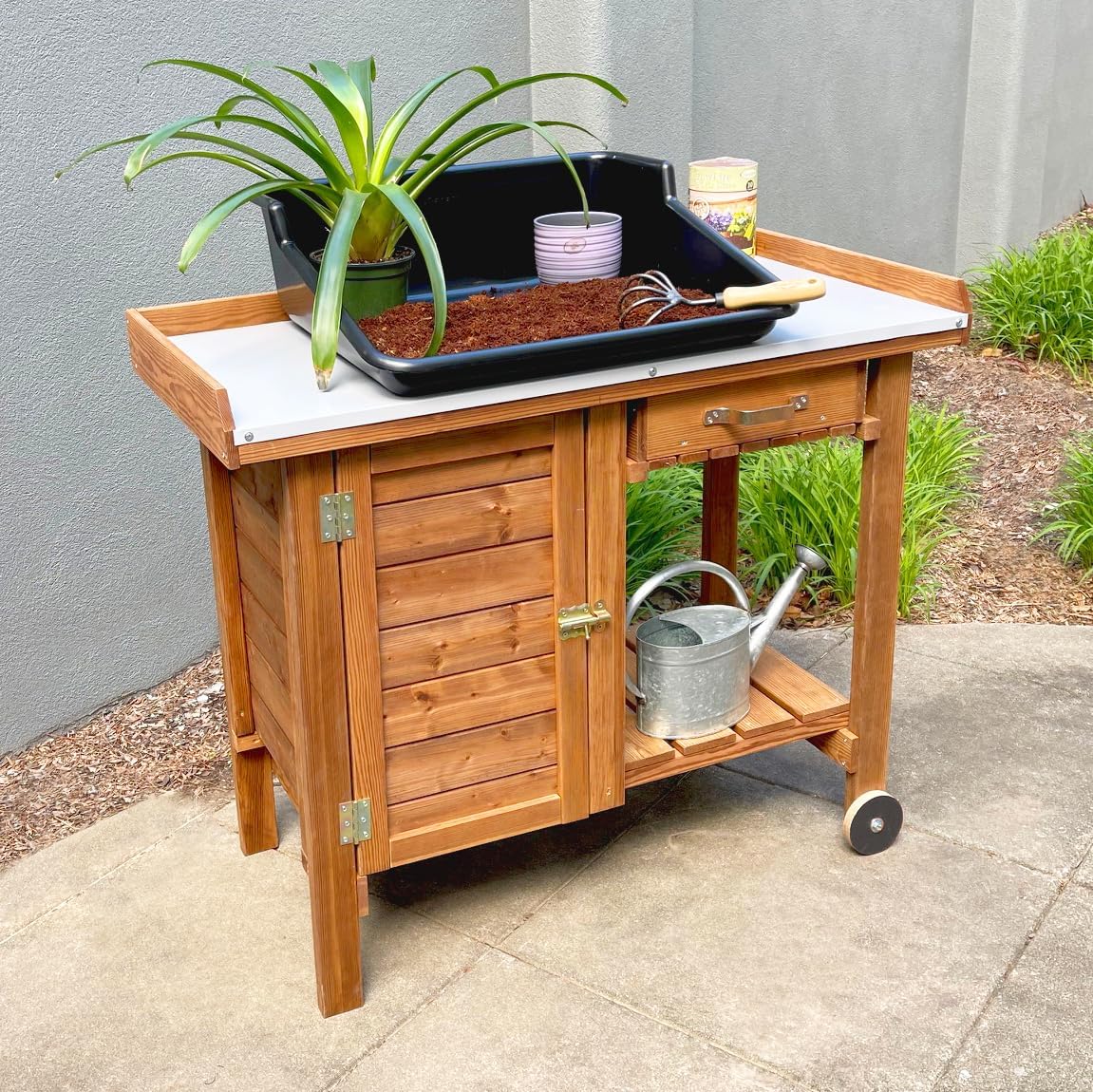 Gardener's Table with Tin Work Surface, Wheels, Cabinet, and Drawer, 42.5' L x 20.5' W x 35.5' H; 73 lbs